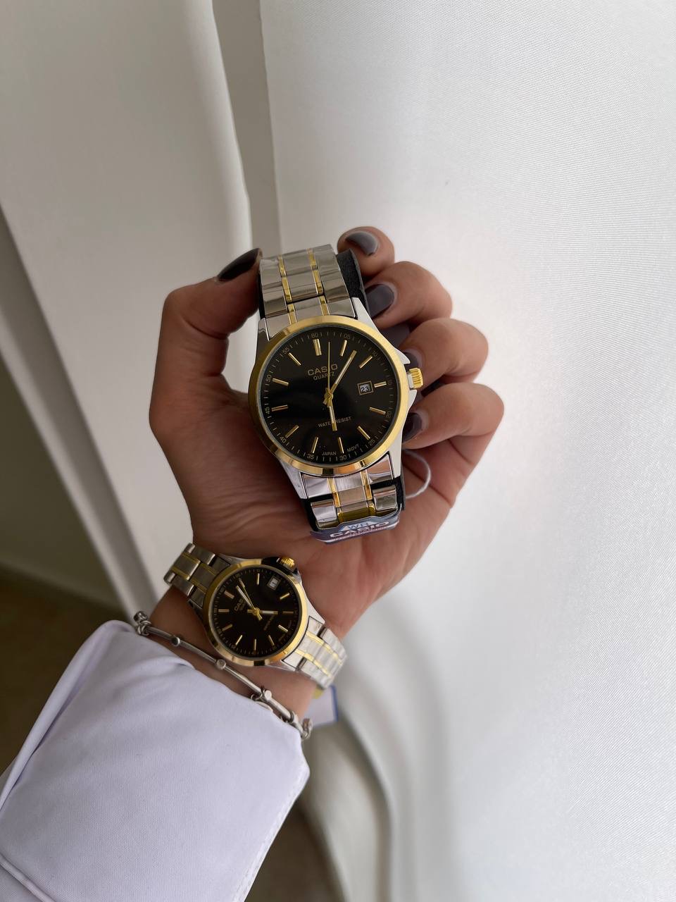 ساعت کاسیو با بدنه طلایی و نقره ‌ای